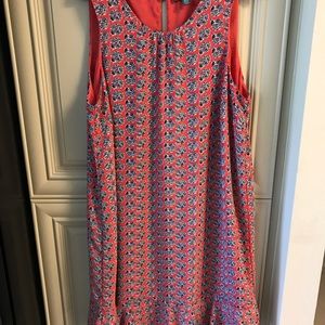 Fully lined, sleeveless dress with ruffle